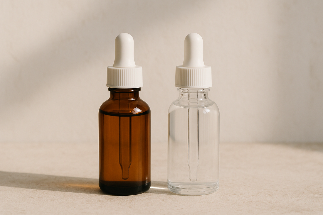 Two serum bottles side by side representing alpha arbutin and tranexamic acid compared for Indian skin